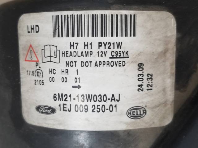 Reflektor lewy 6M2113W030AJ FORD