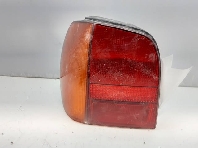 Lampa zespolona tylna lewa 6N0945095 VAG