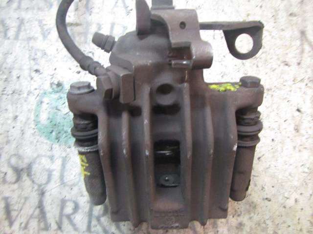 Zacisk hamulcowy tylny lewy 6R0615423 VAG