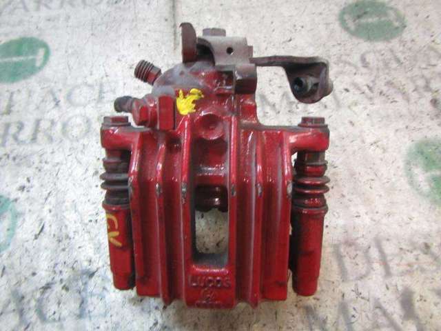 Zacisk hamulcowy tylny lewy 6R0615423 VAG