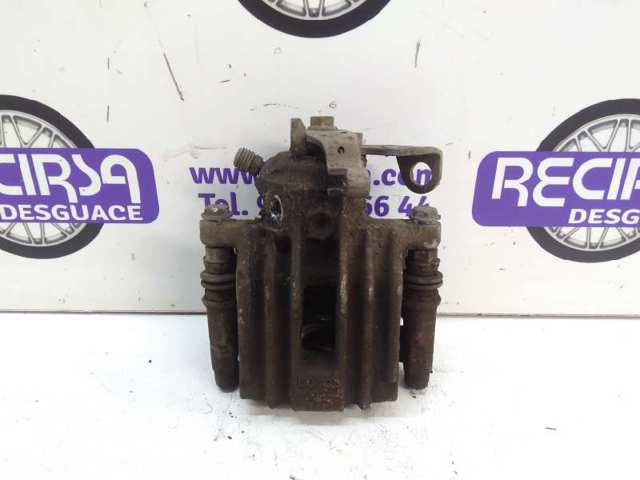 Zacisk hamulcowy tylny lewy 6R0615423 VAG