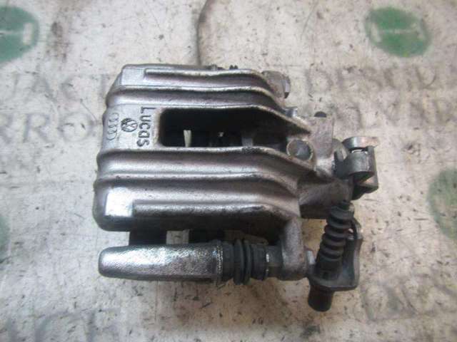 Zacisk hamulcowy tylny lewy 6R0615423 VAG