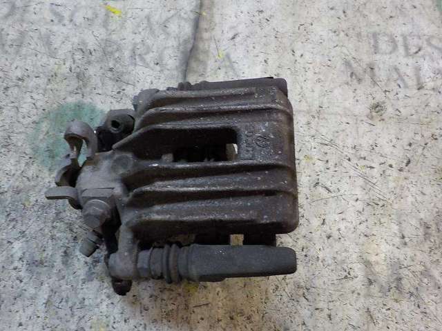 Zacisk hamulcowy tylny lewy 6R0615423 VAG
