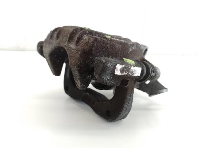 Zacisk hamulcowy tylny lewy 6R0615423A VAG