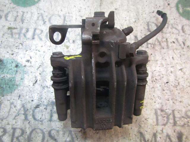 Zacisk hamulcowy tylny prawy 6R0615424 VAG
