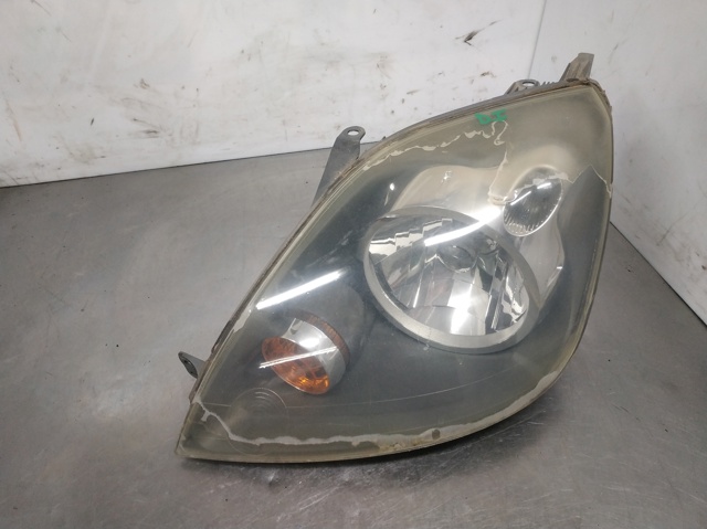 Reflektor lewy 6S6113W030AD FORD