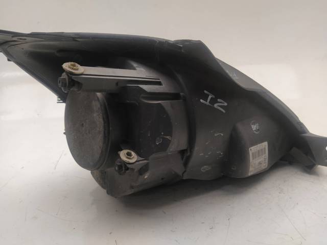 Reflektor lewy 6S6113W030AD FORD