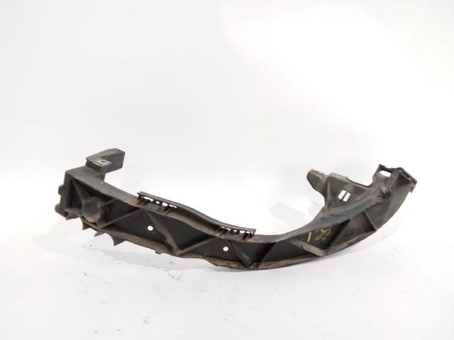 Wsponik (adapter) mocowania reflektora przedniego lewego 7120823 BMW