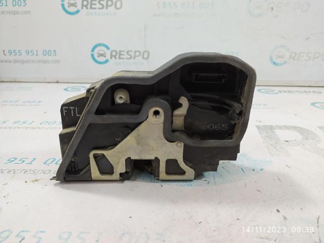 Zamek drzwi przednich lewych 7167065 BMW