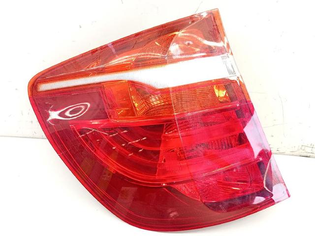 Lampa zespolona tylna lewa zewnętrzna 7217311 BMW