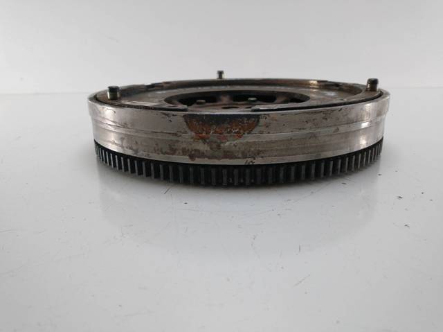 Koło zamachowe silnika 7519484 BMW