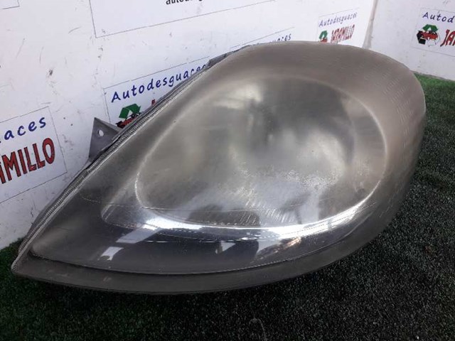 Reflektor lewy 7700311371 RENAULT