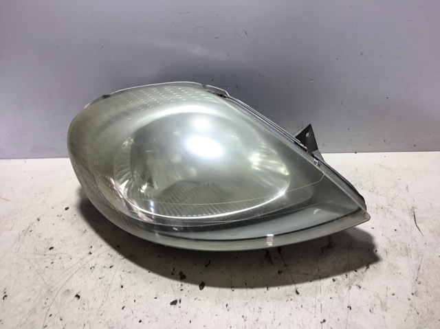 Reflektor prawy 7700311372 OPEL