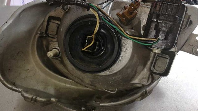 Reflektor prawy 7700311372 OPEL