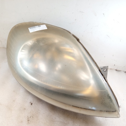 Reflektor prawy 7700311372 OPEL