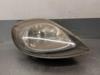 Reflektor prawy 7700311372 OPEL