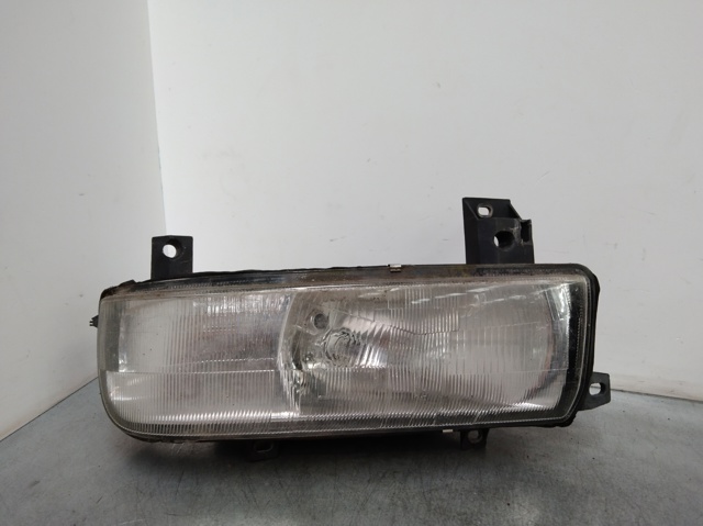 Reflektor lewy 7700352103 RENAULT