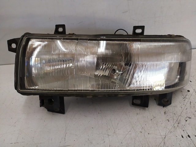 Reflektor lewy 7700352103F RENAULT