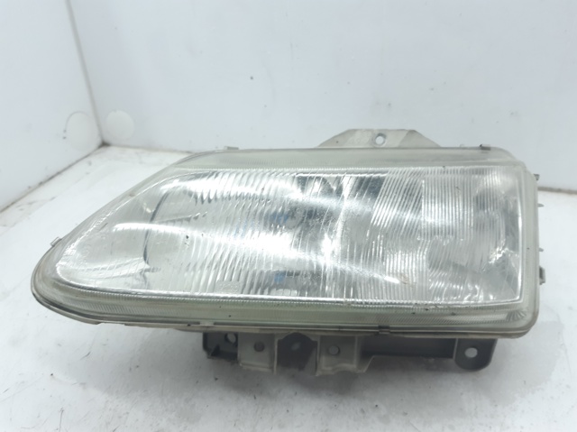 Reflektor lewy 7700820118 RENAULT