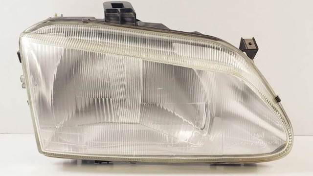 Reflektor prawy 7700831463M RENAULT