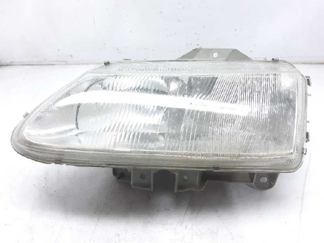 Reflektor lewy 7701038261 RENAULT
