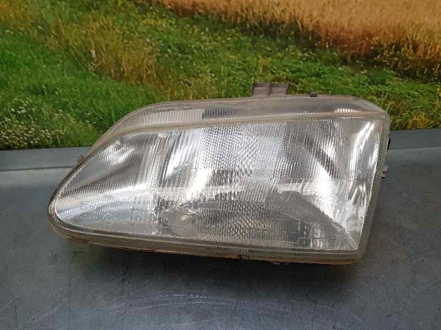 Reflektor lewy 7701040682 RENAULT