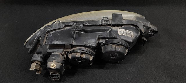 Reflektor lewy 7701047184 RENAULT