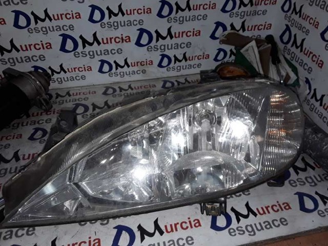 Reflektor lewy 7701047184 RENAULT