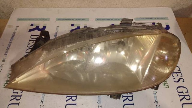 Reflektor lewy 7701047184 RENAULT