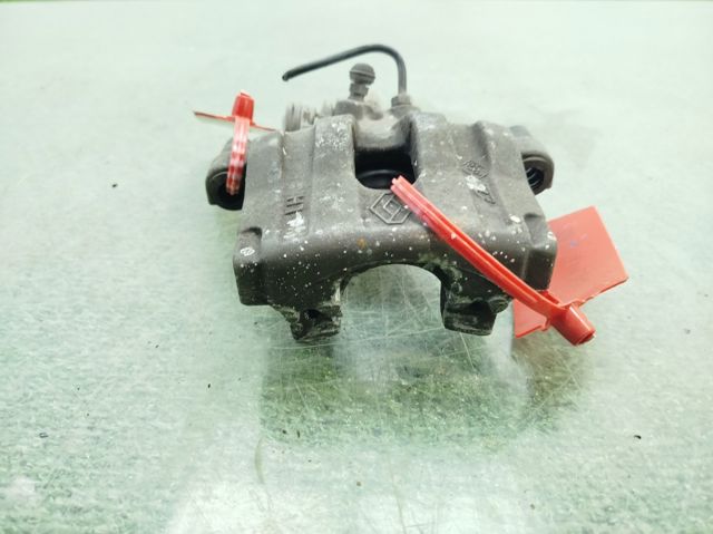 Zacisk hamulcowy tylny lewy 7701049108 RENAULT