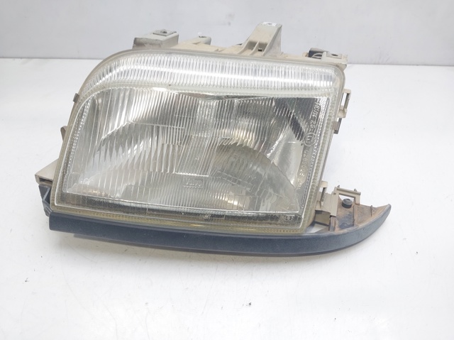 Reflektor lewy 7701054058 RENAULT