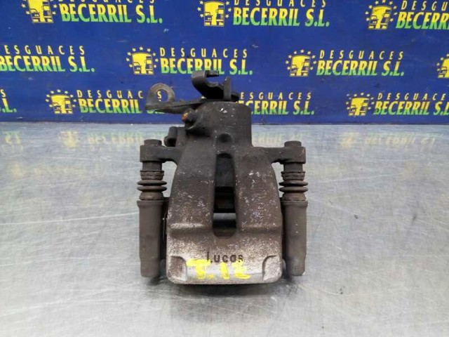 Zacisk hamulcowy tylny lewy 7701206344 Renault (RVI)