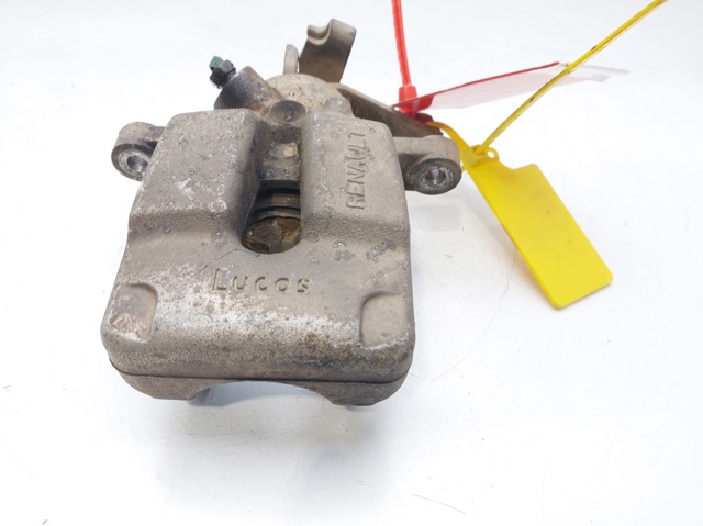 Zacisk hamulcowy tylny lewy 7701206344 RENAULT