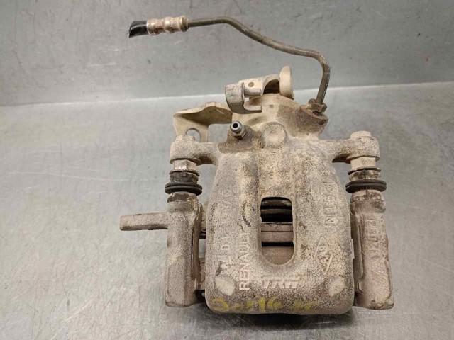 Zacisk hamulcowy tylny lewy 7701209867 RENAULT
