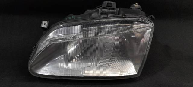 Reflektor lewy 7701672734 RENAULT