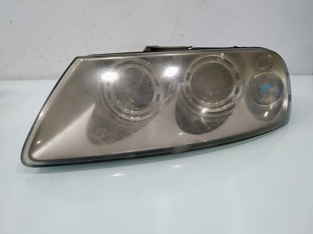 Reflektor lewy 7L6941015BK VAG