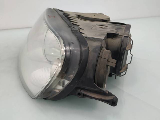 Reflektor lewy 7L6941015CE VAG