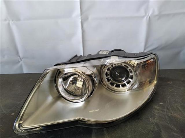 Reflektor lewy 7L6941039 VAG