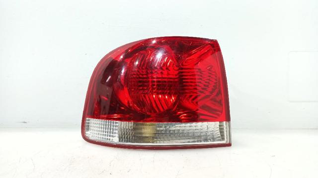 Lampa zespolona tylna lewa zewnętrzna 7L6945095P VAG