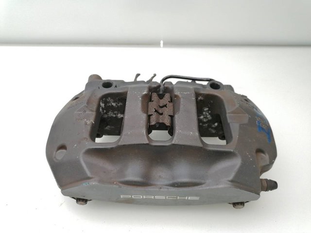 Zacisk hamulcowy tylny lewy 7P0615423 PORSCHE