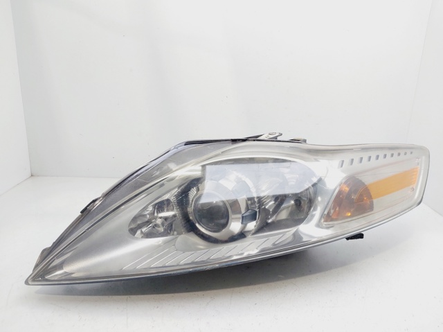 Reflektor lewy 7S7113101AN FORD