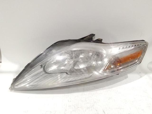 Reflektor lewy 7S7113101AN FORD