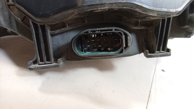 Reflektor lewy 7S7113W030EF FORD