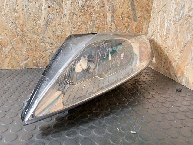 Reflektor lewy 7S7113W030EF FORD