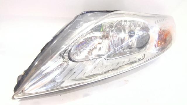 Reflektor lewy 7S7113W030EF FORD