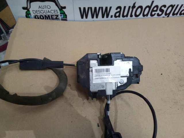 Zamek drzwi przednich prawych 80500AX11A NISSAN