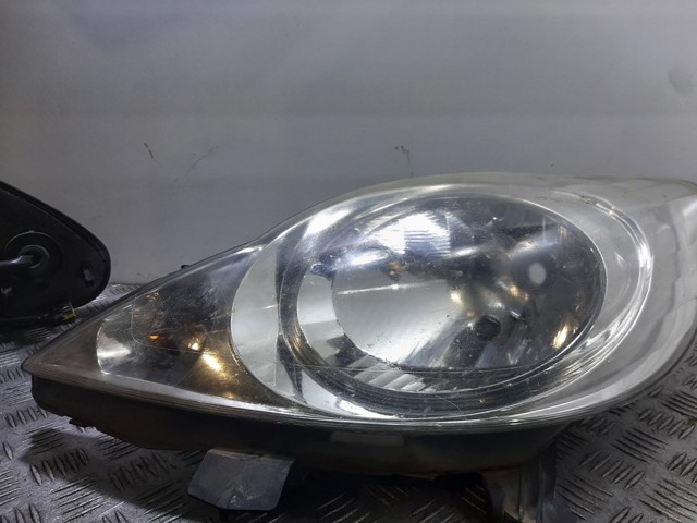 Reflektor lewy 811500H030 PEUGEOT