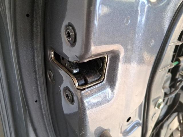 Zamek drzwi przednich lewych 813103Z000 HYUNDAI