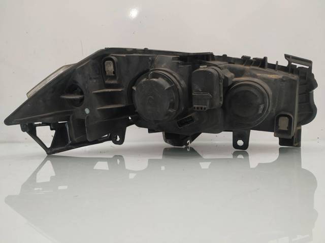 Reflektor lewy 8200073220J RENAULT