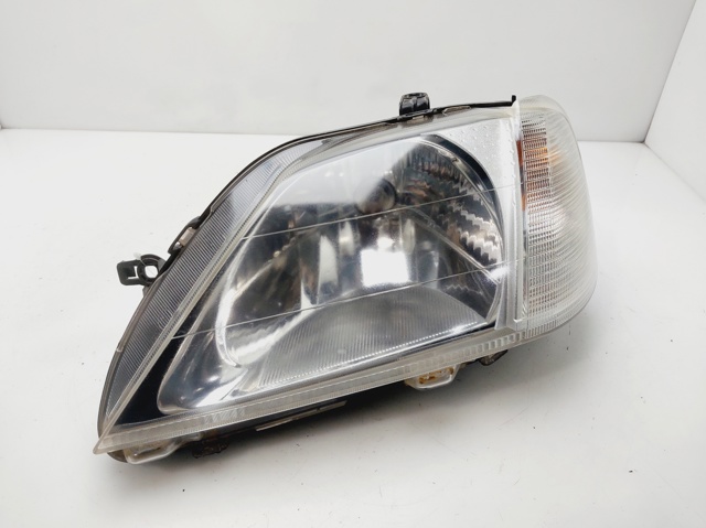 Reflektor lewy 8200211005 RENAULT